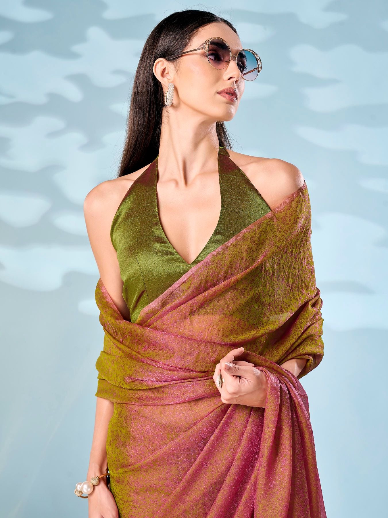 Two tone pink and green colored woven saree with tassles on pallu